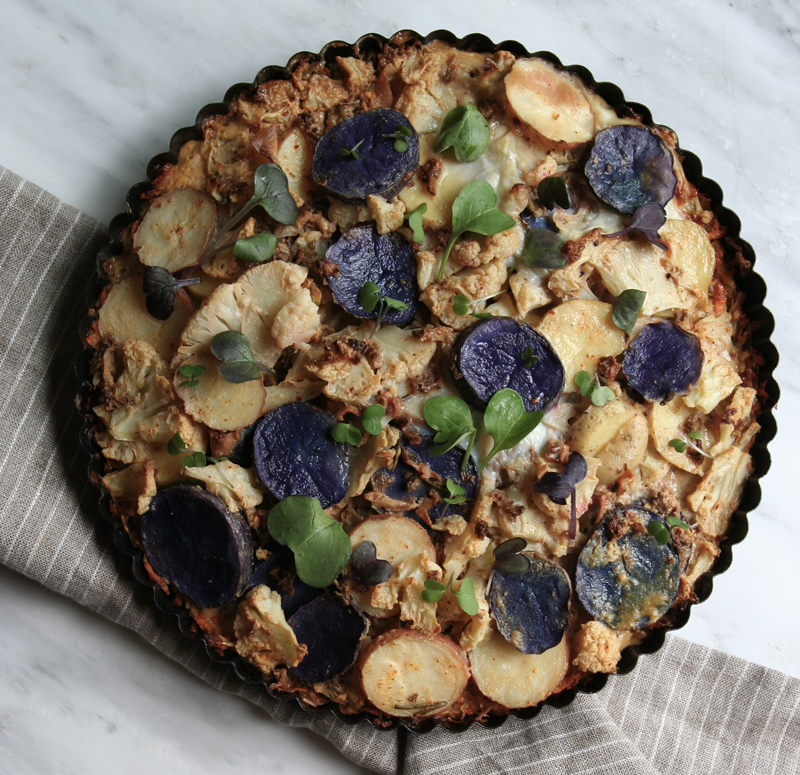 Cauliflower and Tricolor potato pie with morel mushrooms