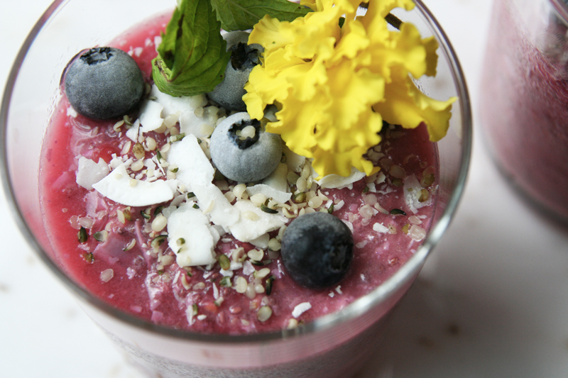 Raspberry + Beet Chia Seed Pudding with Hemp, Coconut, Edible Flowers and Frozen Blueberries